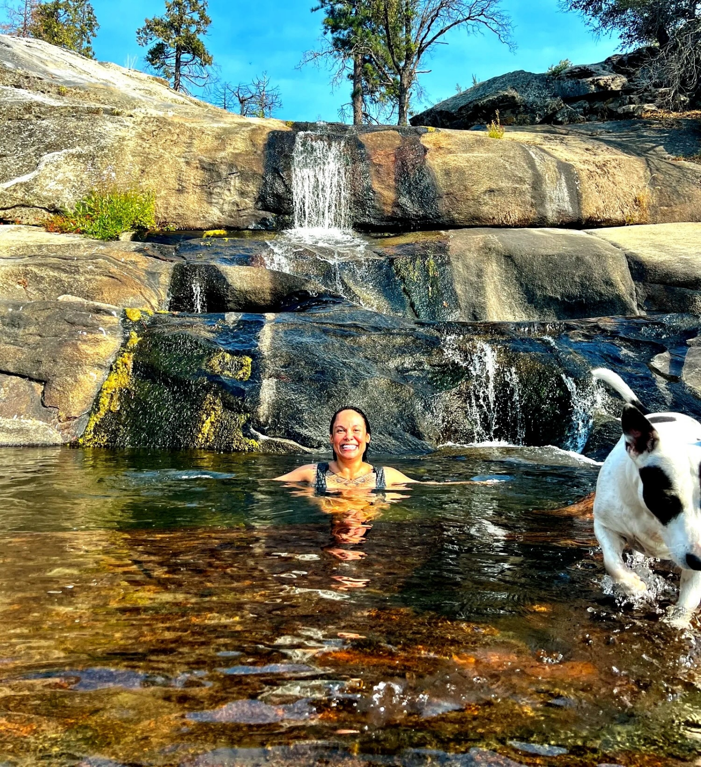 woman swimming at musick creek falls by shaver lake